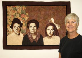 Photo of Lynn Cooper with quilt